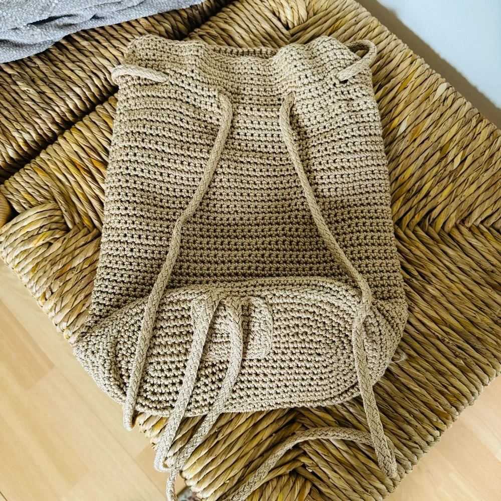 The Sak crochet drawstring backpack with zip pocket